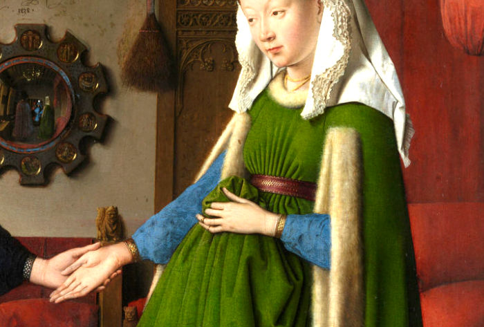 The couple in The Arnolfini Portrait holding hands